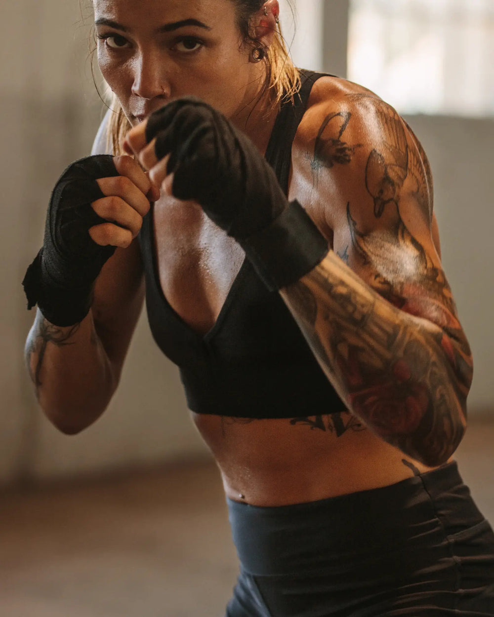 Woman using 4 Gauge Pre-Workout